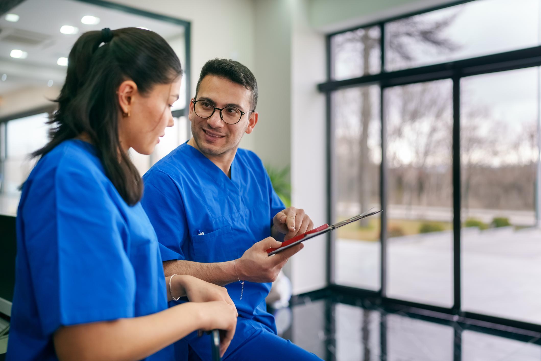 Nurse talking to another nurse